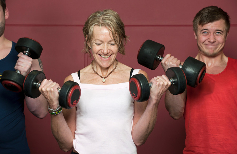 Older woman lifting weights