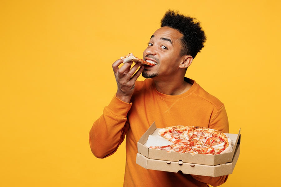 Man Eating Pizza