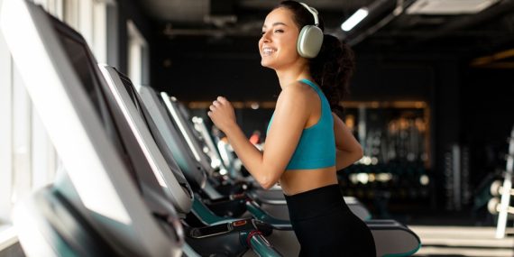 Woman Training on Treadmill