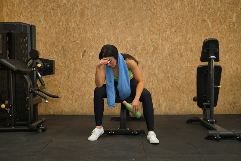 Tired Woman at the Gym