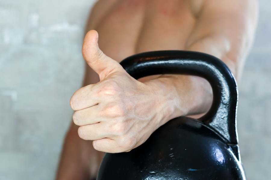 Muscular Man Thumbs Up
