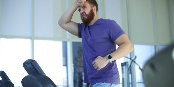 Tired man on treadmill