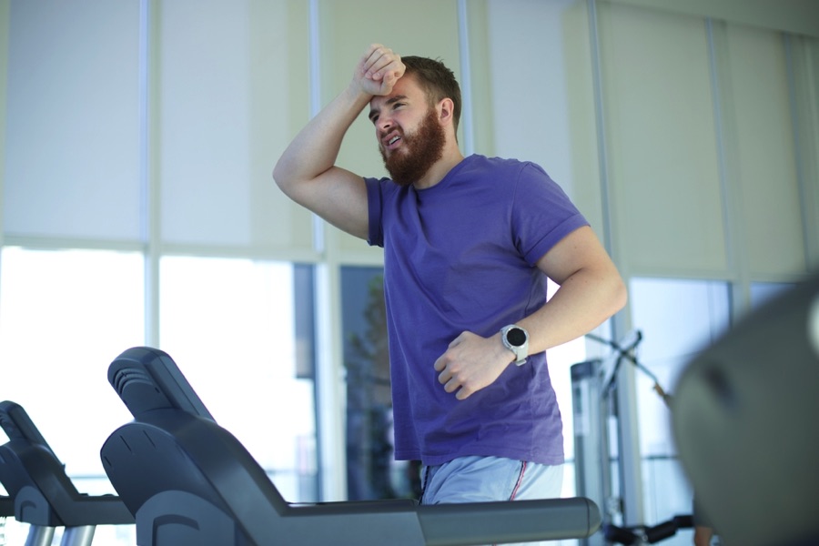 Tired man on treadmill